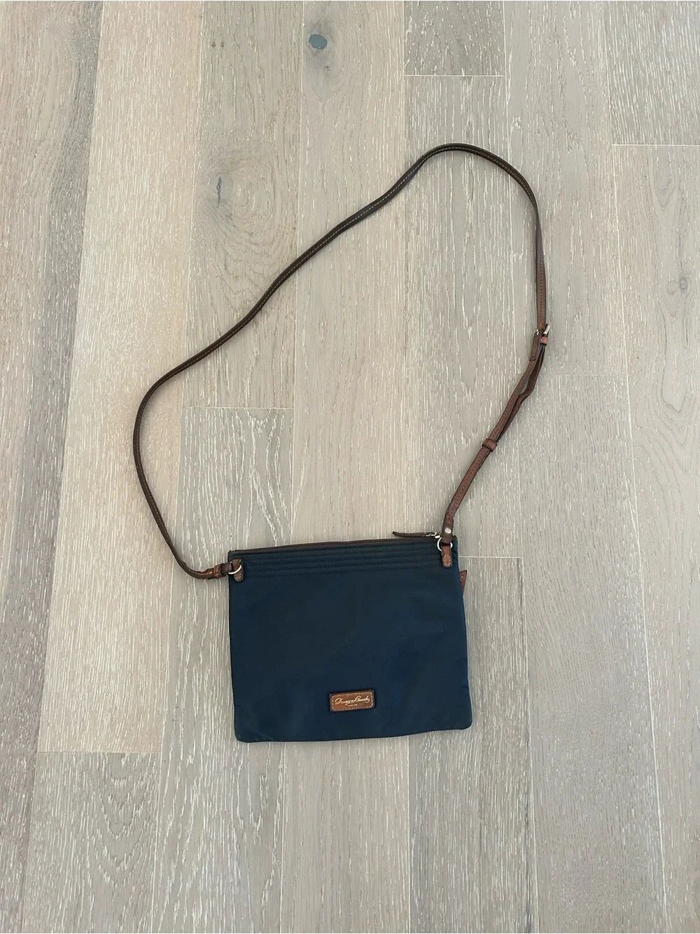 Dooney & Bourke Navy Crossbody with Brown Leather Strap